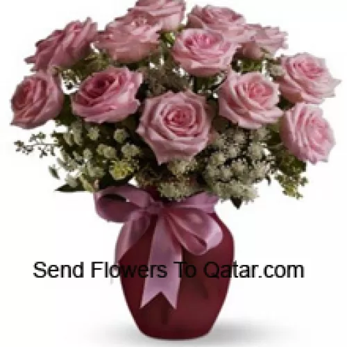 12 Pink Roses With Assorted White Fillers In A Glass Vase