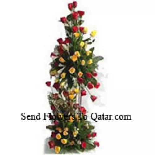 Arrangement de 4 pieds de haut de 150 roses rouges et 150 roses jaunes