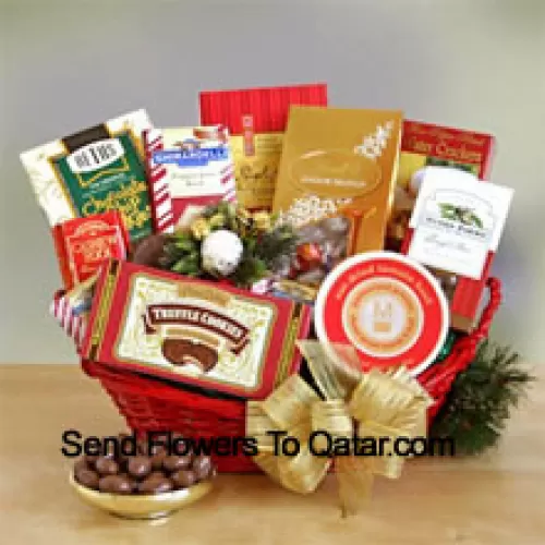 This handsome red oval basket comes decorated with a big bow to make a great presentation. Inside are many reasons to smile as she sample the savory and sweet selection: crackers, cheese, Cashew Roca, truffle cookies, mocha almonds, chocolate chip cookies, Lindt truffles, Ghirardelli almond chocolate bar, and English tea cookies. (Please Note That We Reserve The Right To Substitute Any Product With A Suitable Product Of Equal Value In Case Of Non-Availability Of A Certain Product)