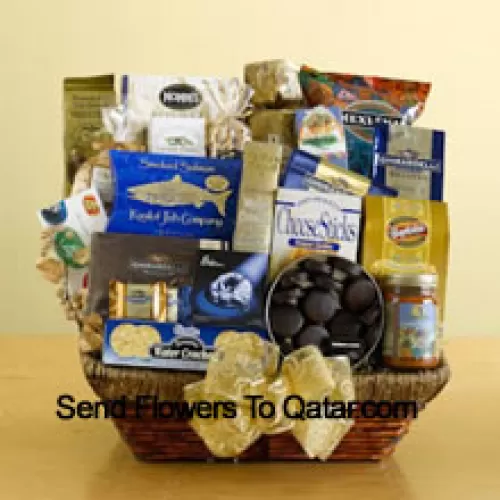 We've packed a wicker basket with a delightful assortment of gourmet foods, all arranged to make a great impression. The recipient is sure to appreciate this gift and will enjoy everything packed inside including tortilla chips, salsa, cheese sticks, brie cheese, water crackers, smoked salmon, pistachios, almonds, popcorn, pretzels, cheese swirls, Jelly Belly jelly beans, assorted Ghirardelli chocolates, wafer cookies, a tin of chocolate-covered sandwich cookies, a bag of Ghirardelli squares, and biscotti. (Please Note That We Reserve The Right To Substitute Any Product With A Suitable Product Of Equal Value In Case Of Non-Availability Of A Certain Product)