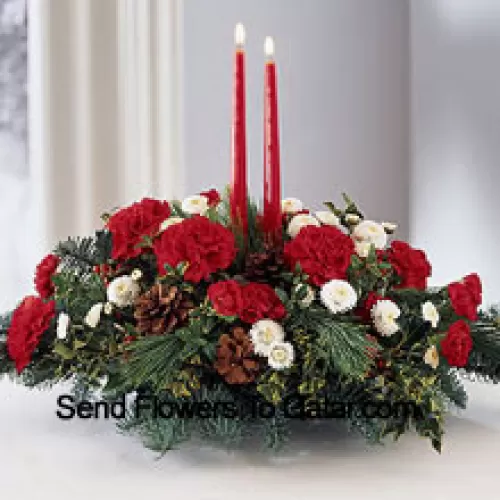 Share the joy this season with a festive fresh arrangement of red carnations and white pompons, winter greens and pinecones. Two red taper candles add seasonal charm to this centerpiece. (Please Note That We Reserve The Right To Substitute Any Product With A Suitable Product Of Equal Value In Case Of Non-Availability Of A Certain Product)